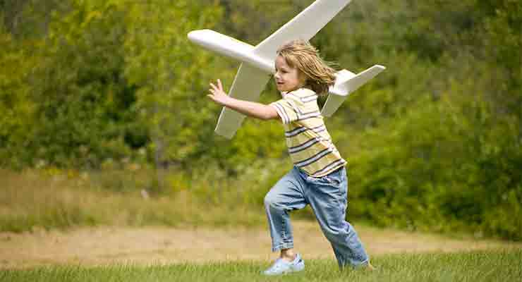 boy playing in yard